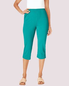 bottom half of model wearing teal capris
