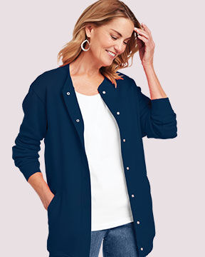 model wearing blue jacket over white shirt